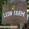 custom aged walnut with custom color logo for farm wood business sign