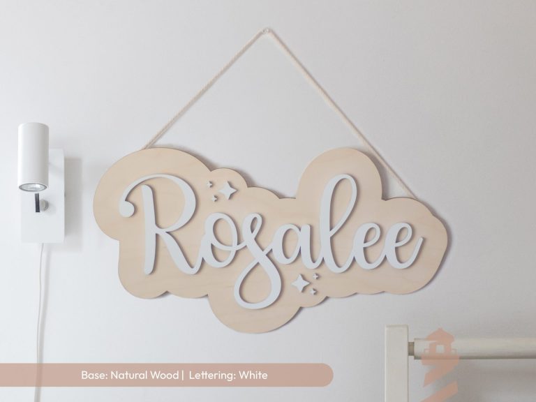 Girl's personalized first name sign with natural wood base with white lettering