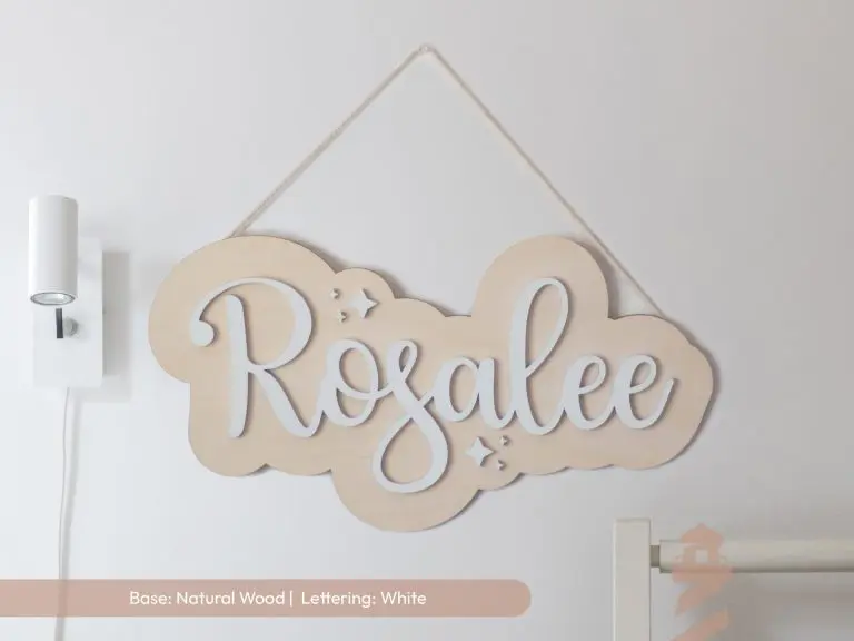 Girl's personalized first name sign with natural wood base with white lettering