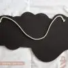 back side of kid's cotton rope hung laser cut wooden custom name sign.