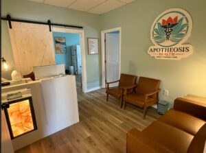 Custom Health care reception business sign - laser cut with 3D logo lettering on a white wood sign with color lettering