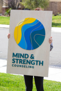 custom 3D wood sign with bespoke painted lettering and logo. Laser cut counseling business sign