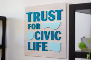 White wash custom laser cut sign for civic community organization logo