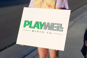 White sign with color letters for a merch company
