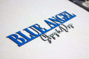 Wall-mounted custom business logo sign with adhesive backing and mounting template wood sign