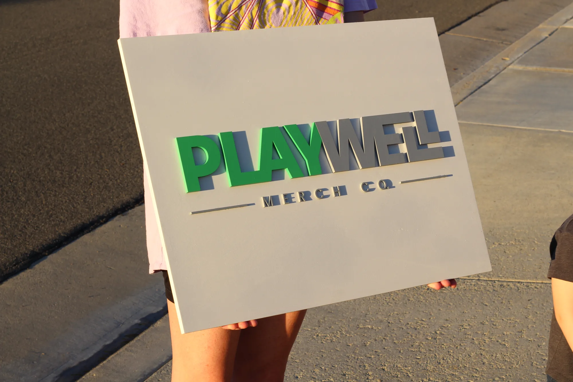 Detail of the layered logo showing depth and shadow