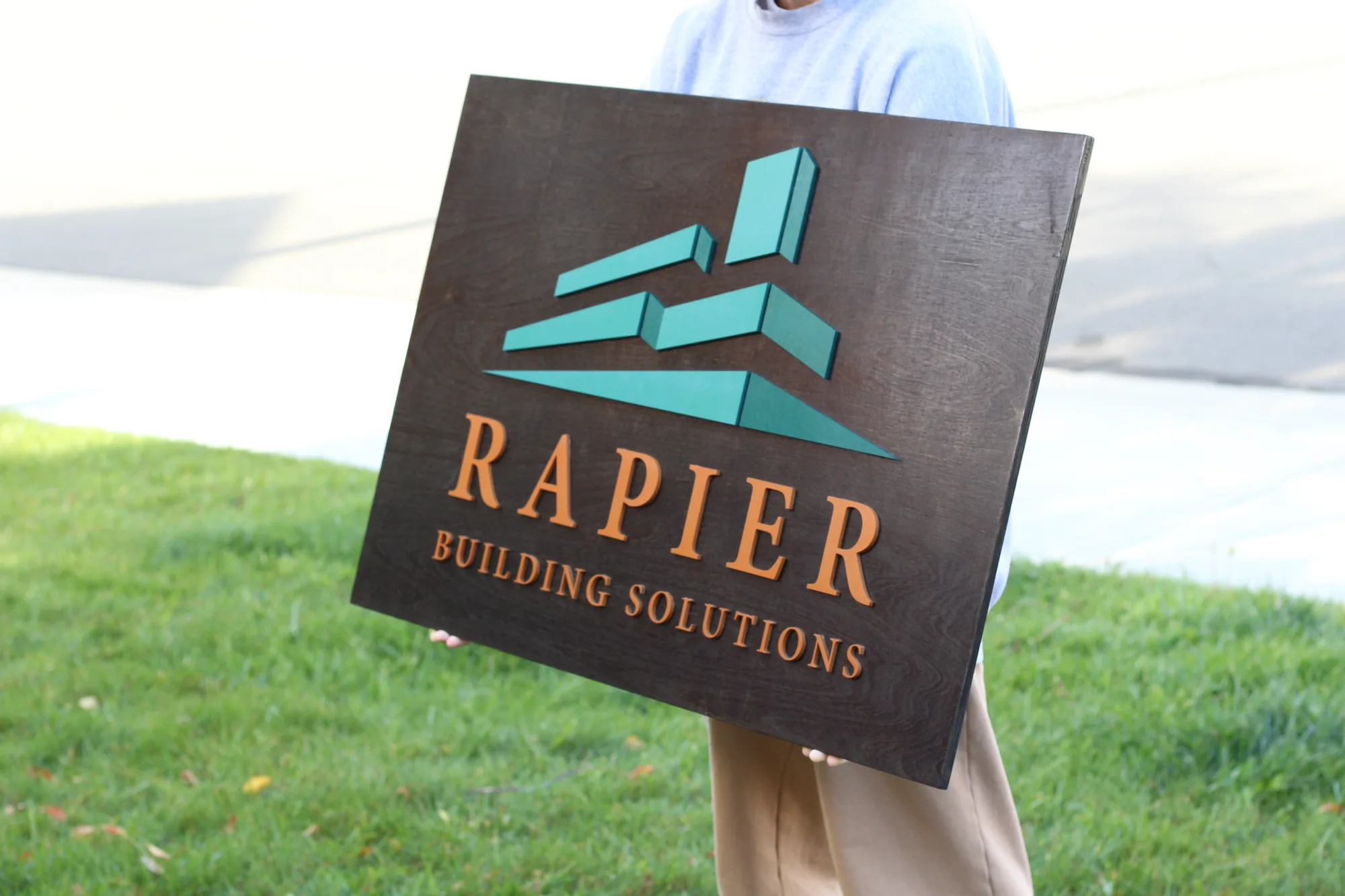 Exterior building services sign shown in place