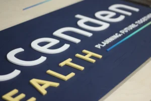 Custom wood sign by Lighthouse Laser Co. - Health Company Office