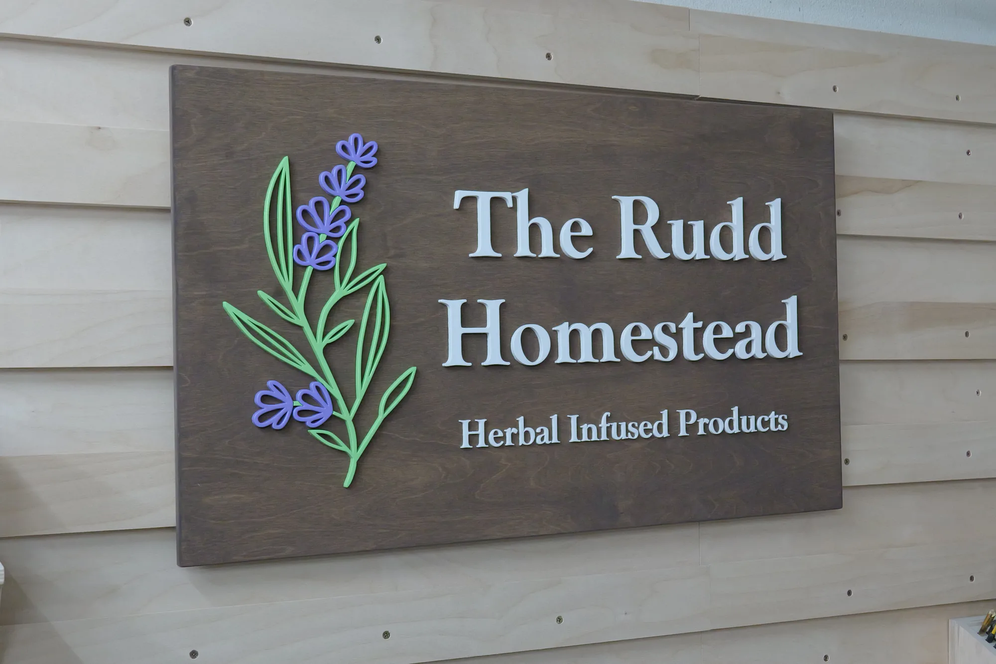 Aged walnut custom homestead sign with white lettering