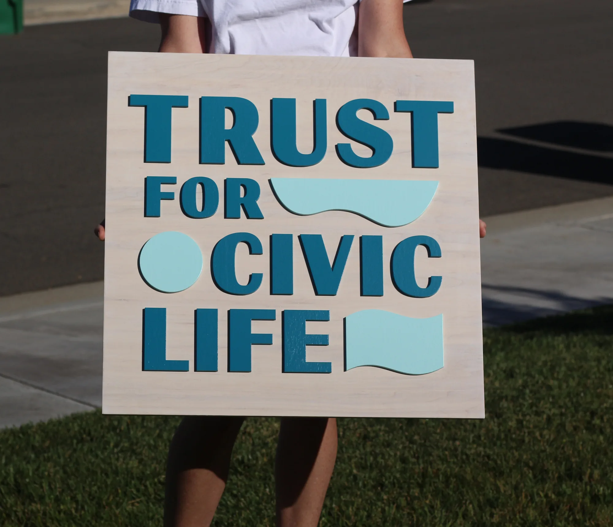 Nonprofit office sign shown mounted