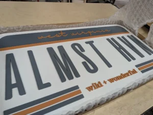 Custom wood sign by Lighthouse Laser Co. - Novelty License Plate