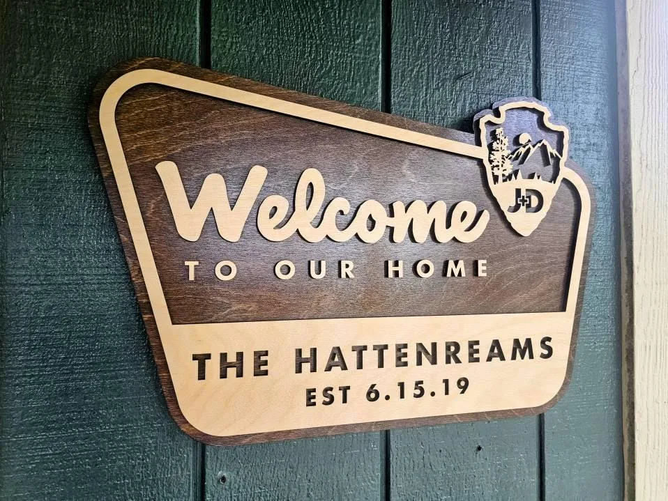 Welcome to our home park style sign with custom initials in the arrowhead